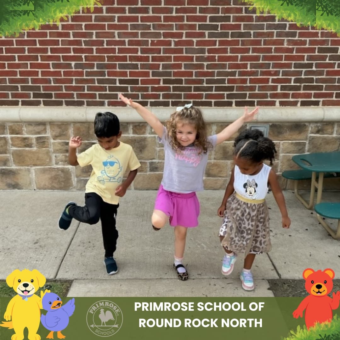 Children at Primrose School of Round Rock North practicing balance and gross motor skills during an outdoor activity.