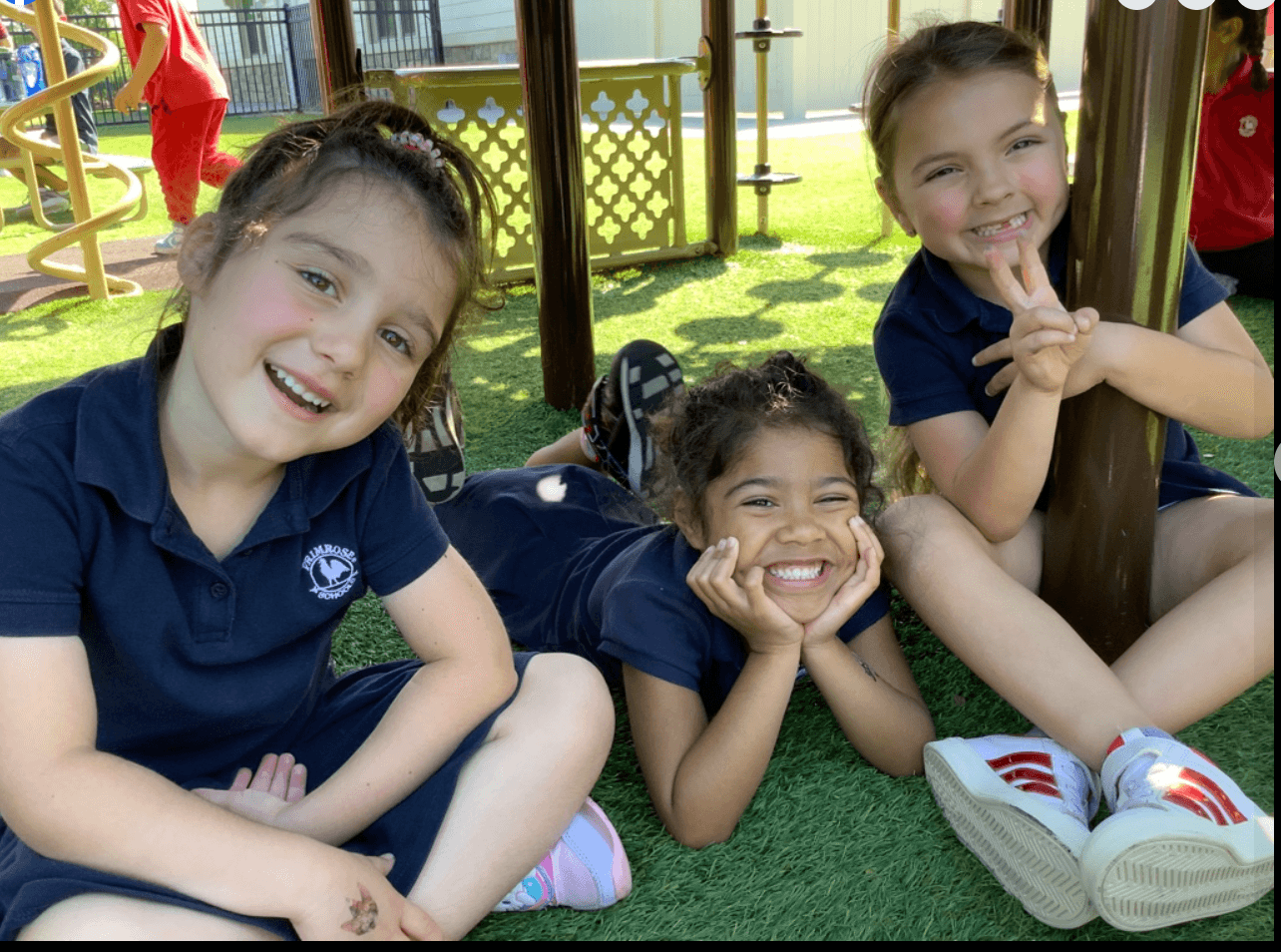 VPK students smiling on the playground