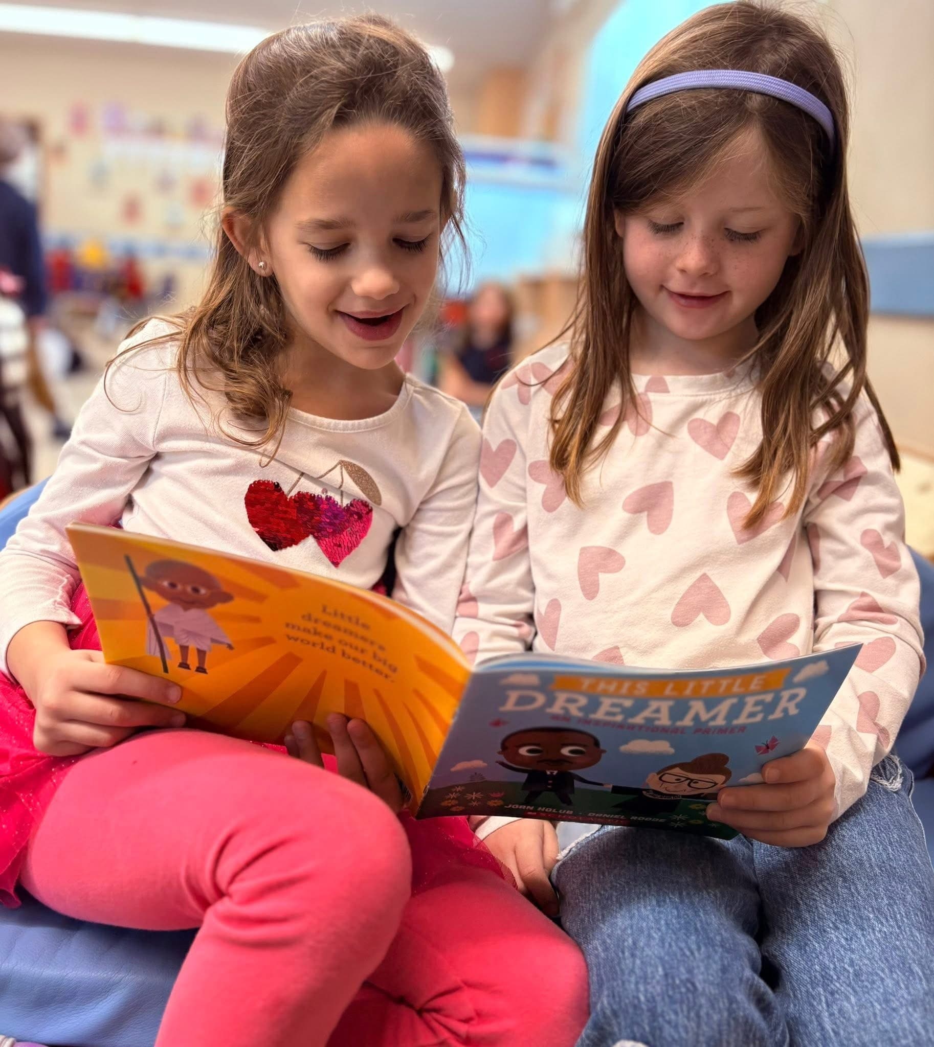 Children building their reading skills during summer camp.