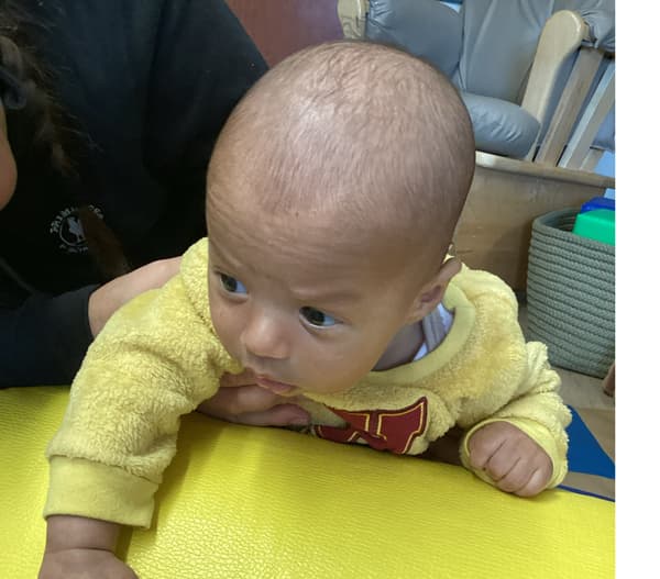 Child working on tummy time