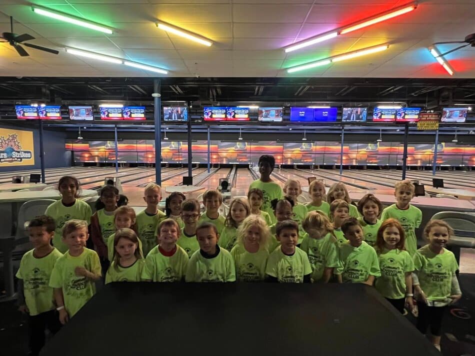 children at a bowling alley