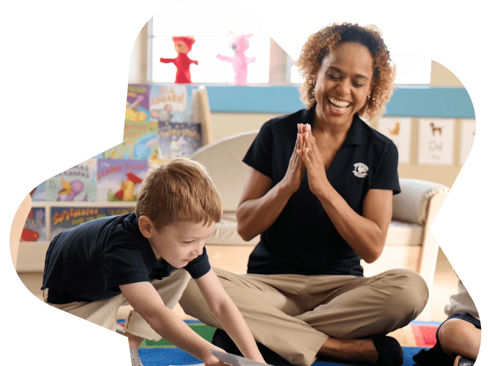 primrose teacher and child playing