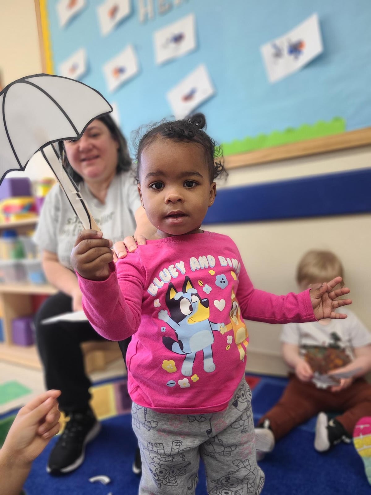 Puddle Hop with Umbrellas