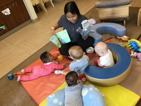 Primrose School of Cottage Grove Infants Story Time with Mia in Infants Classroom