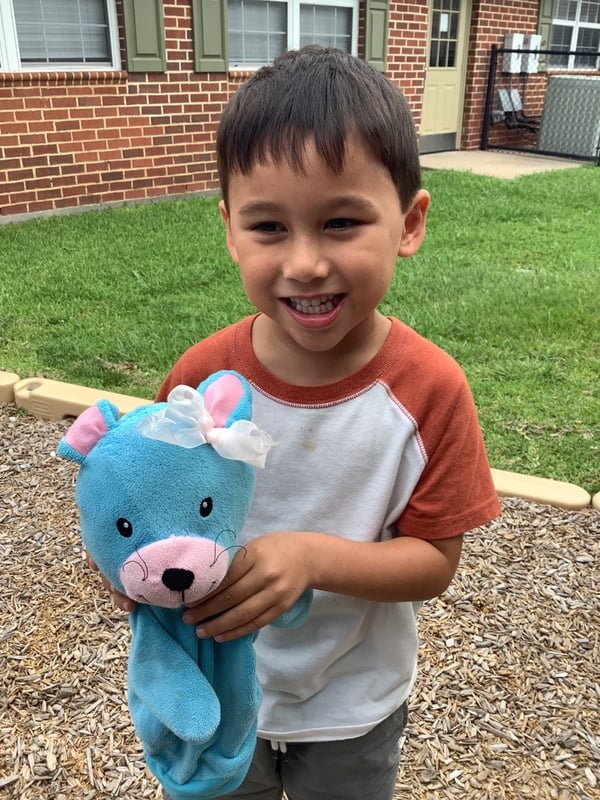 child, bunny, daycare, smile, character development 