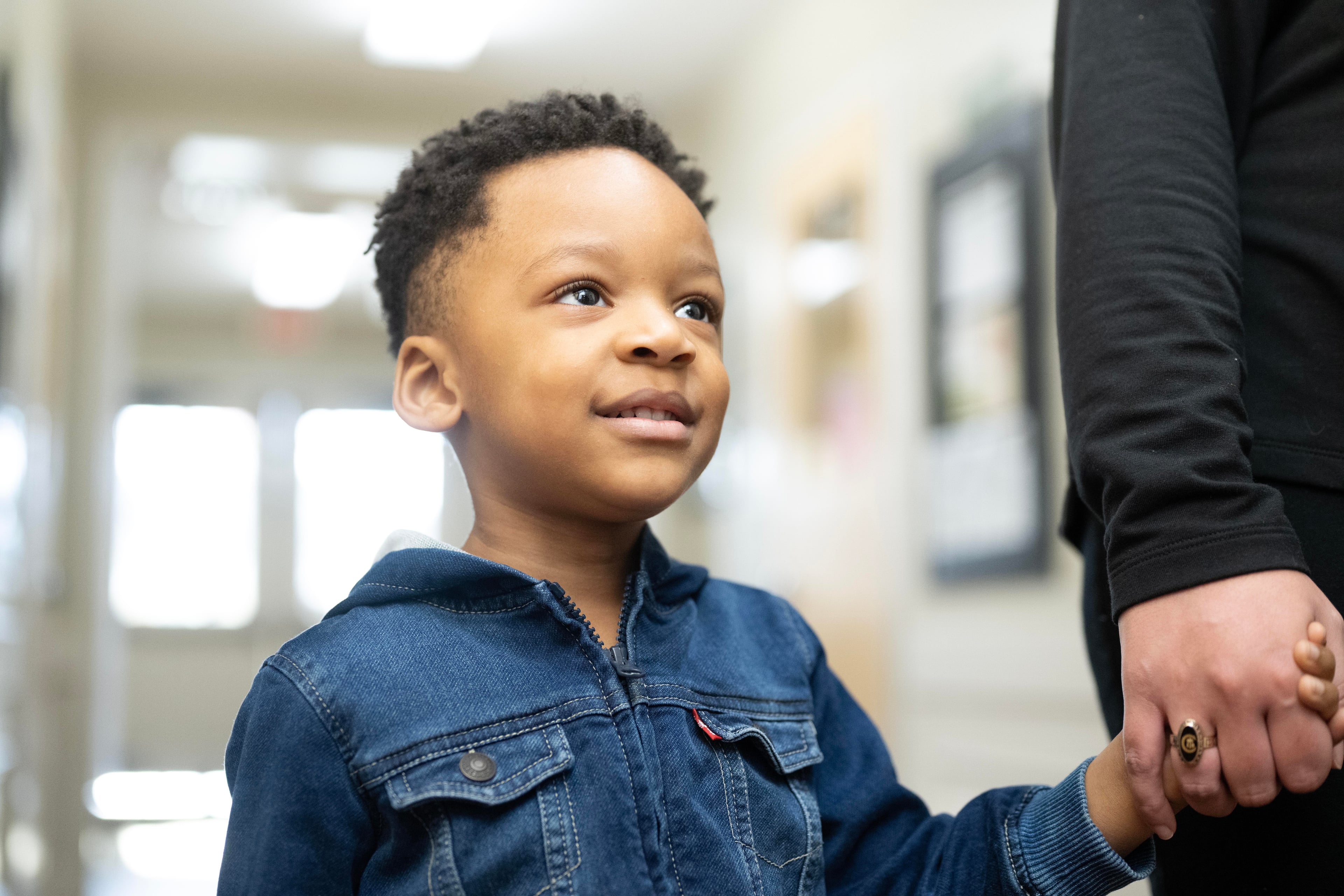 primrose preschooler walking to class