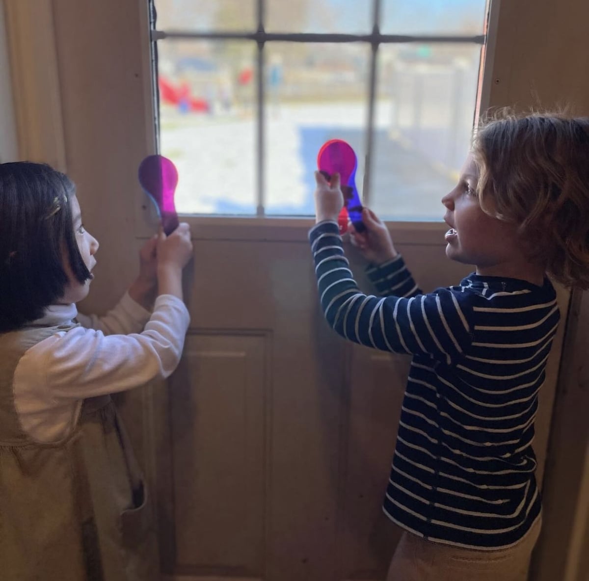 Students playing with color and light activity 