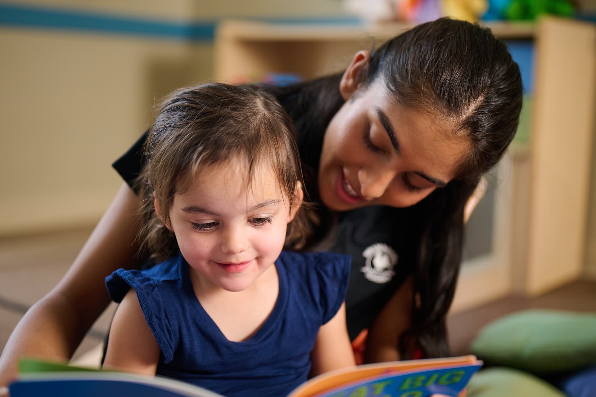 Primrose teacher reading to student