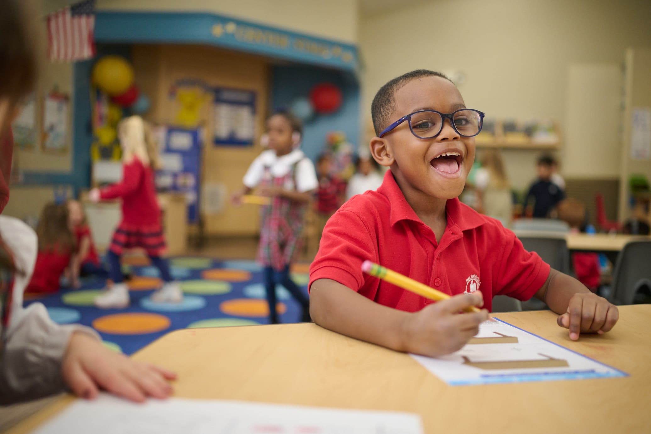 kindergarten student doing math problems