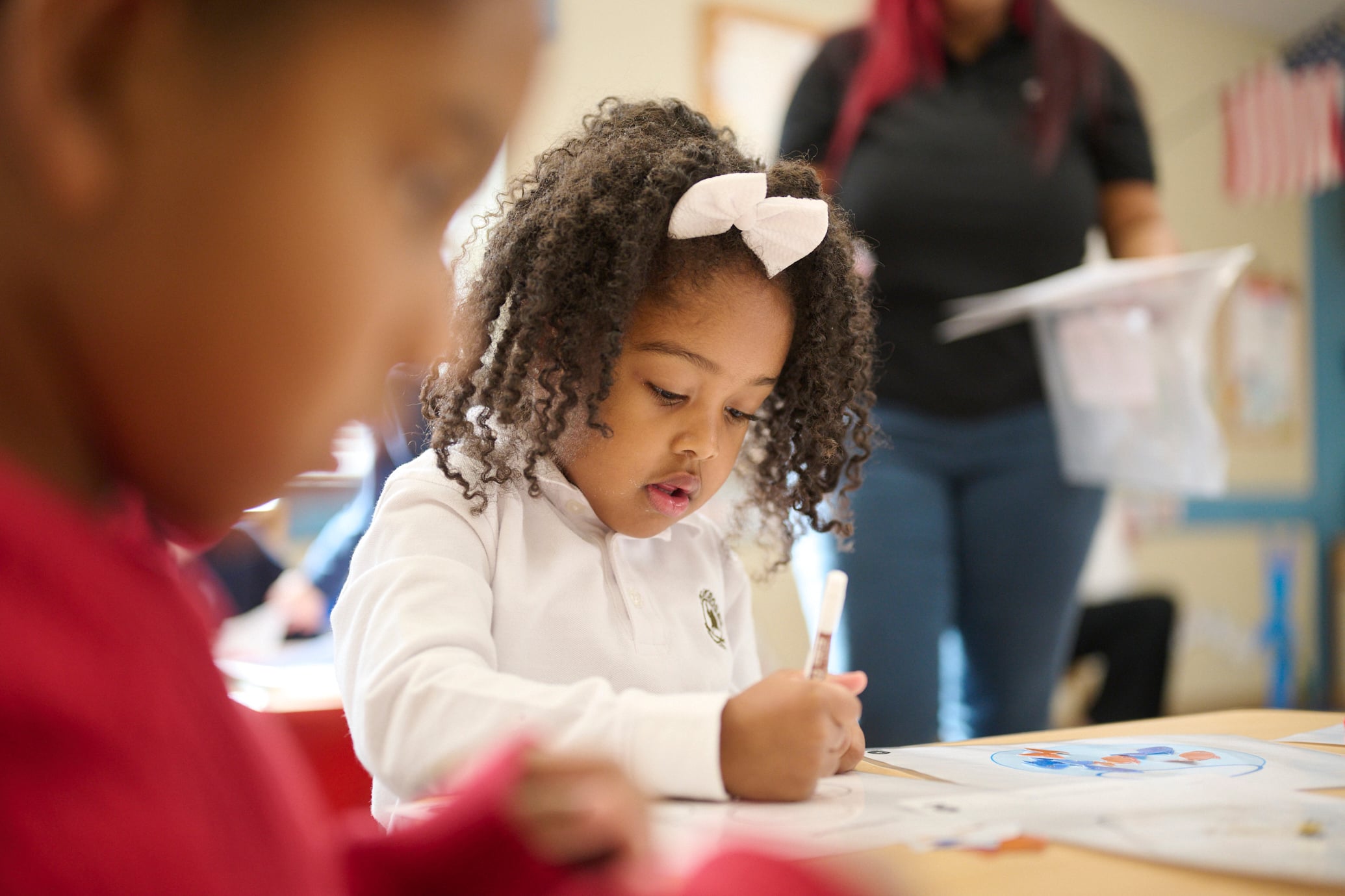 primrose student doing a writing exercise