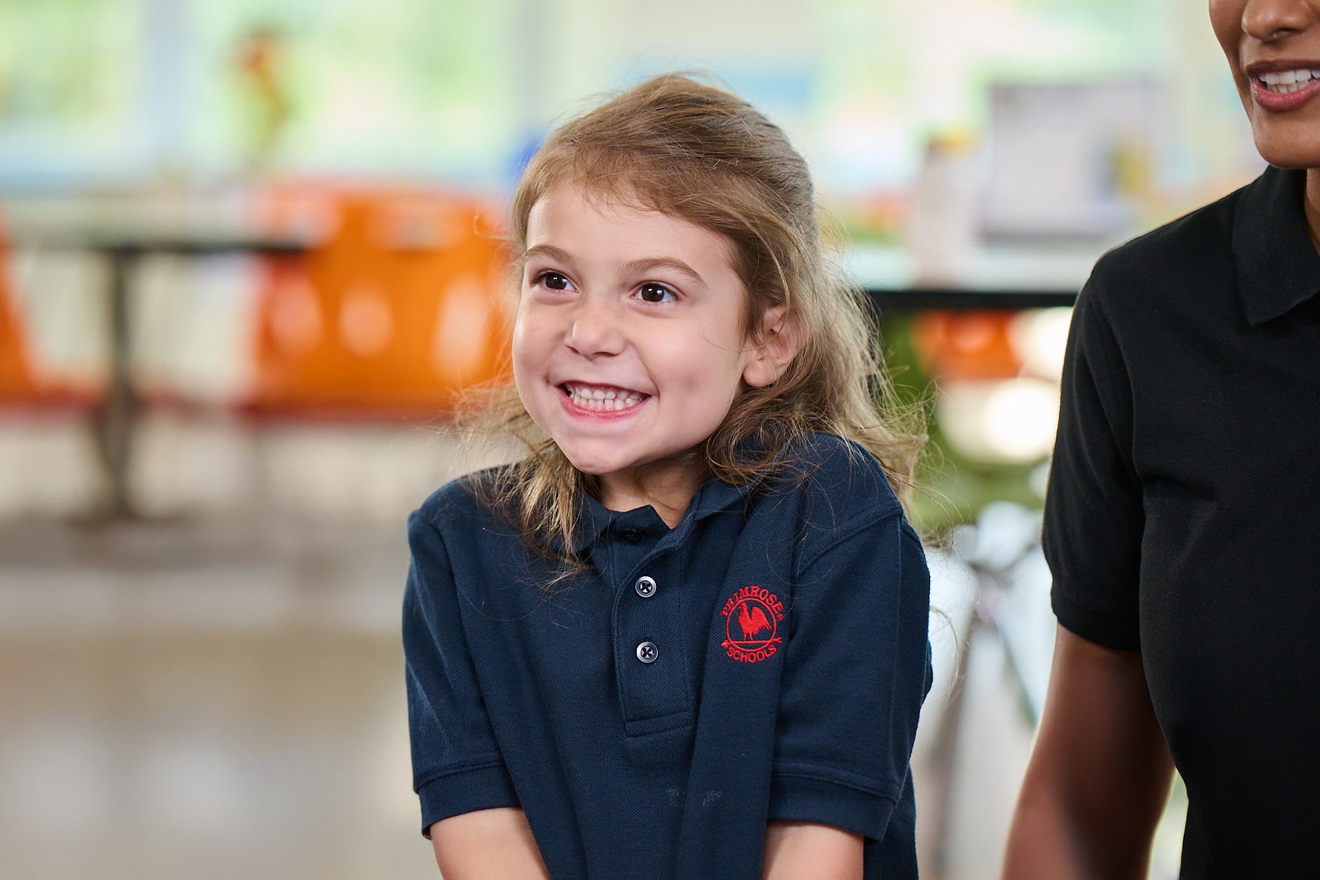 child enjoying circle time with class