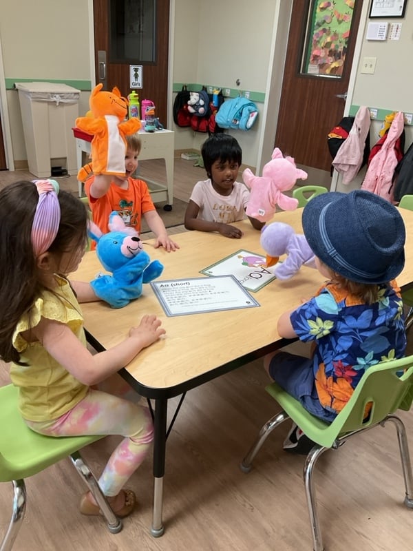 Primrose Jerome preschoolers playing with puppets