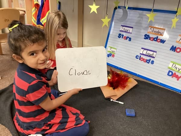 child learning how to write