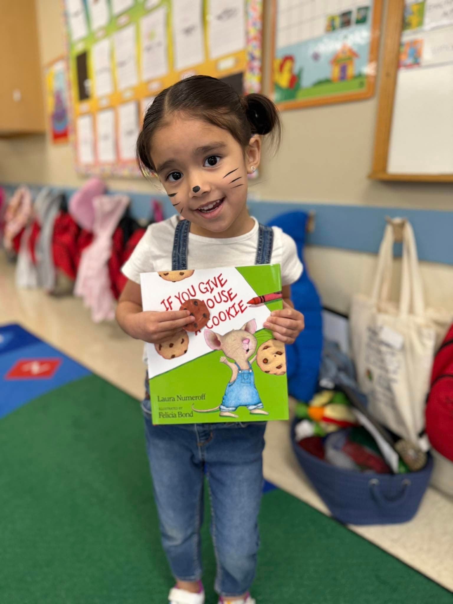 child sharing book