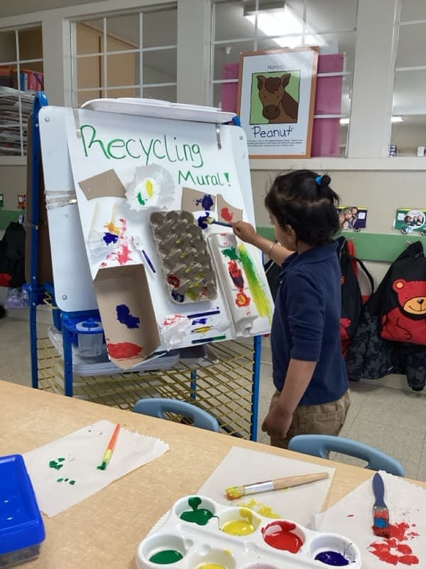 preschooler learning about recycling