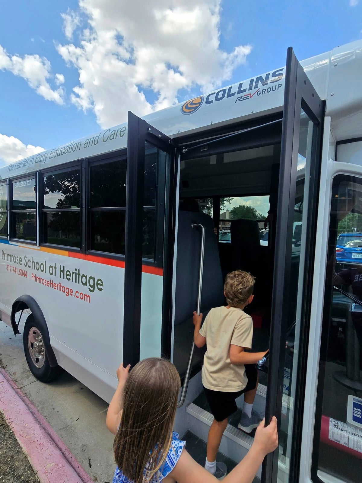 Primrose School students in Keller, Texas boarding the school bus during the first week of school