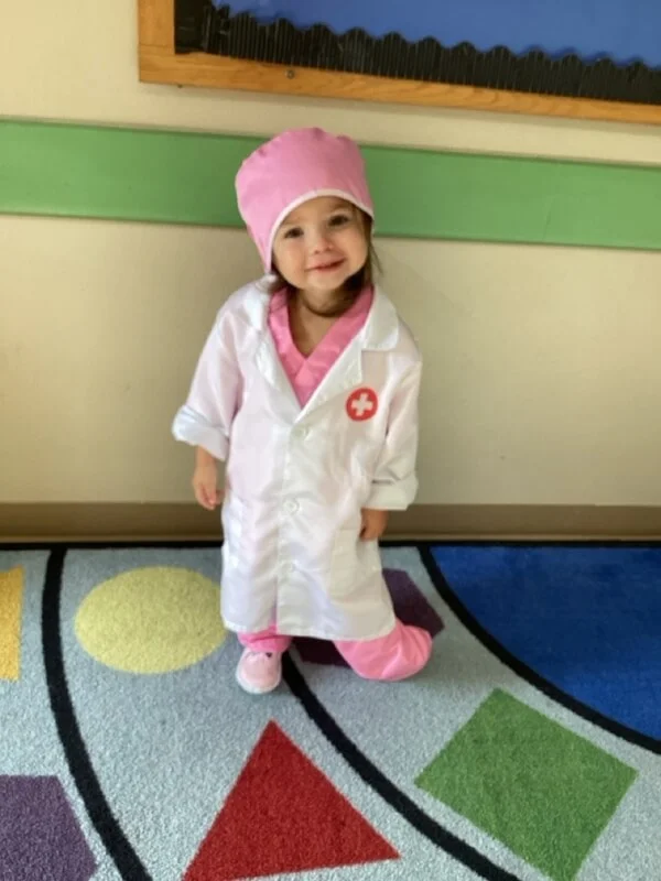 child dressed as a nurse