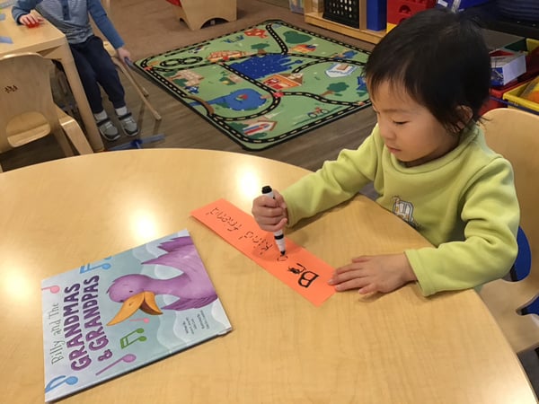 Writing practice with book and tracing