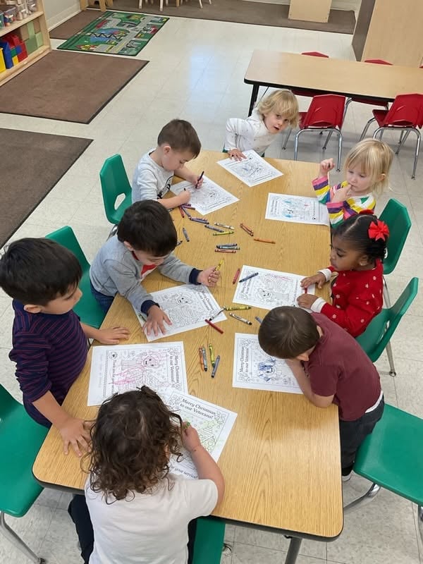 students working together on art project