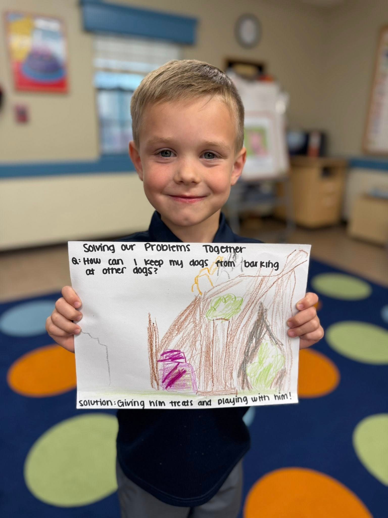 Young student displaying a problem-solving writing project with a drawing and written solution, building critical thinking and communication skills.
