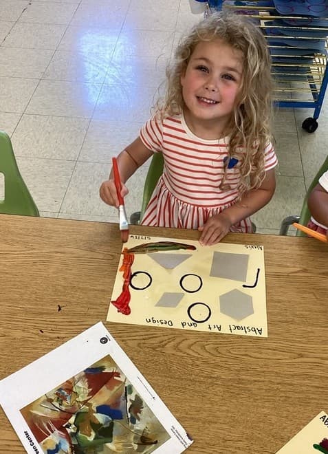 Preschool student creating an art project at Primrose School, encouraging creativity, self-expression, fine motor development, and hands-on early childhood learning.