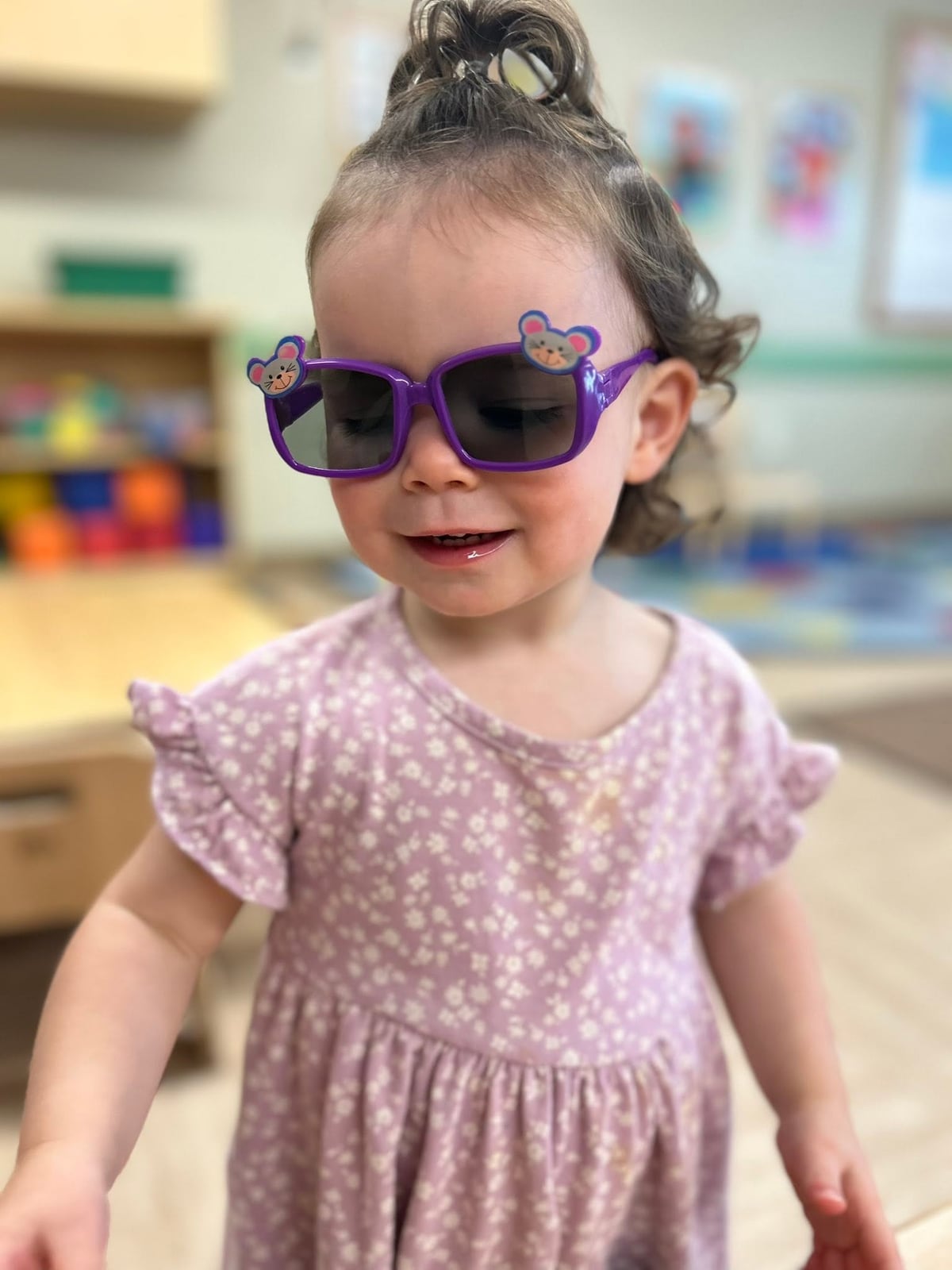 A child wearing sunglasses