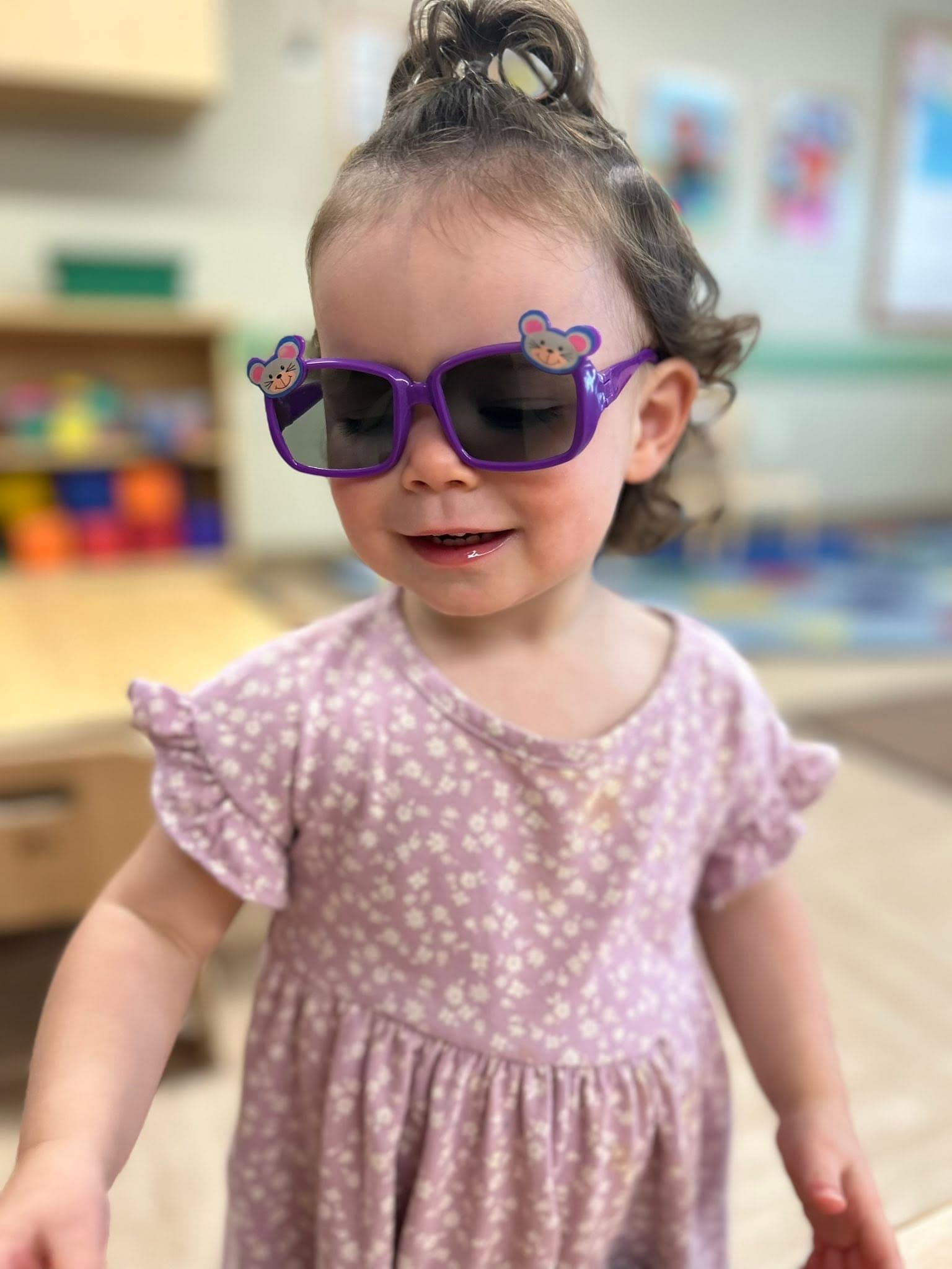 A child wearing sunglasses