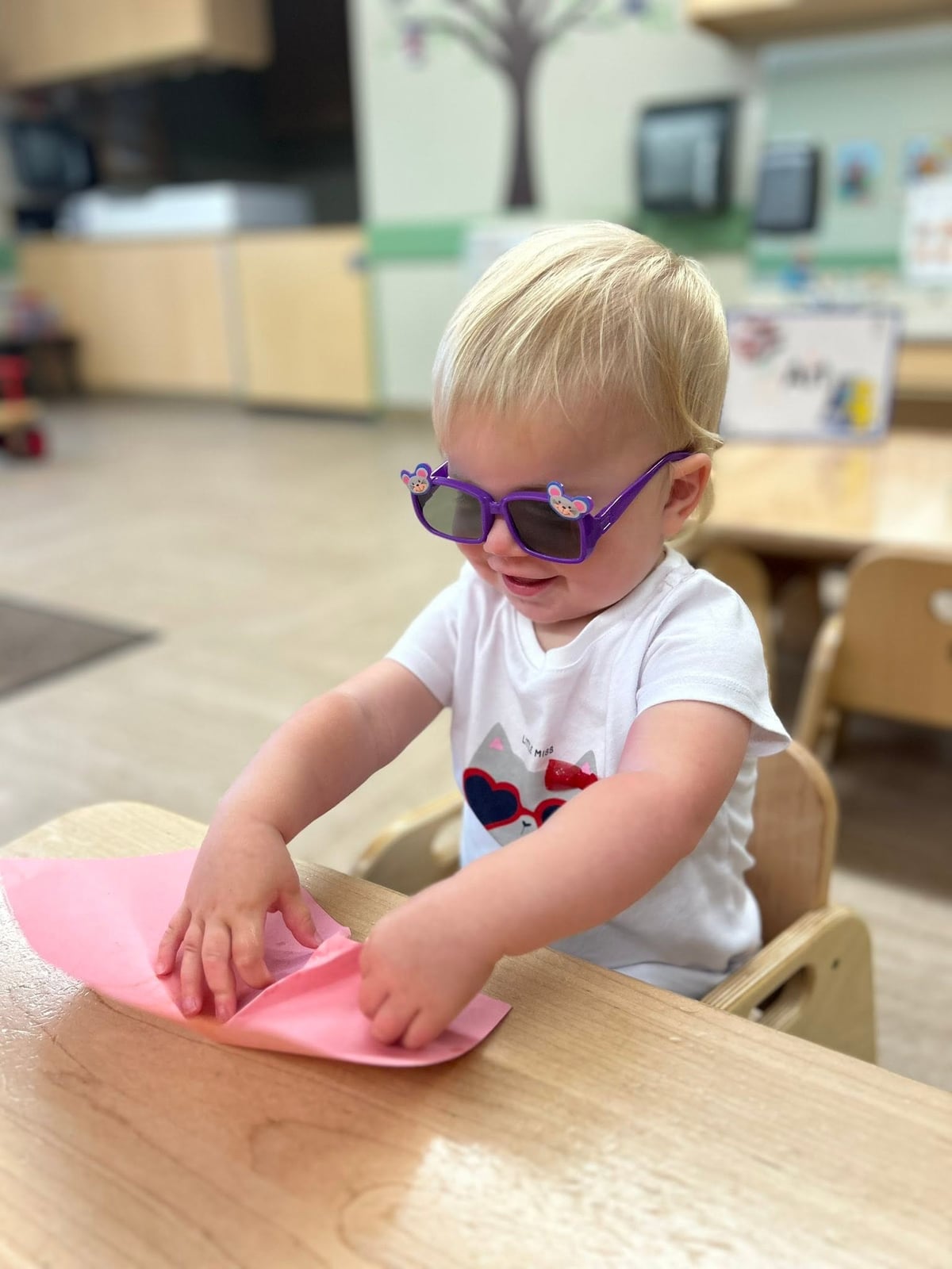 A child wearing sunglasses