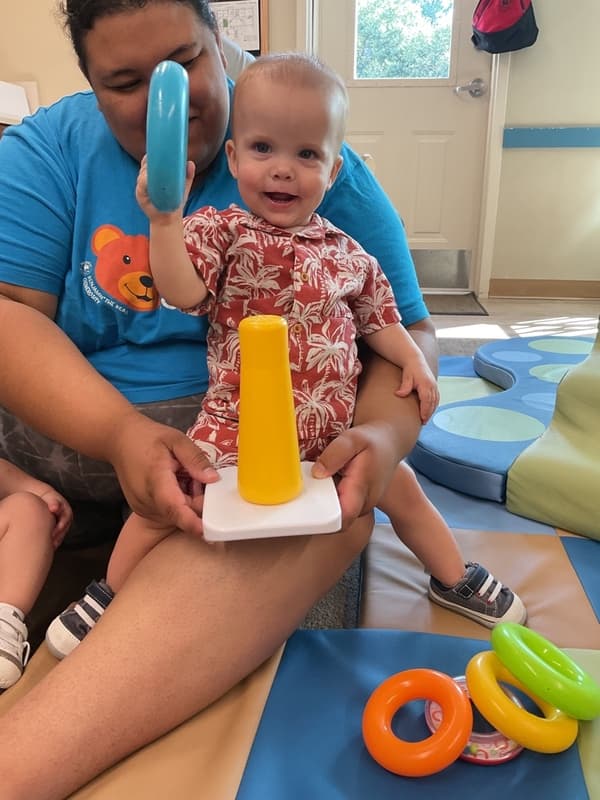 Owen uses the ring toy
