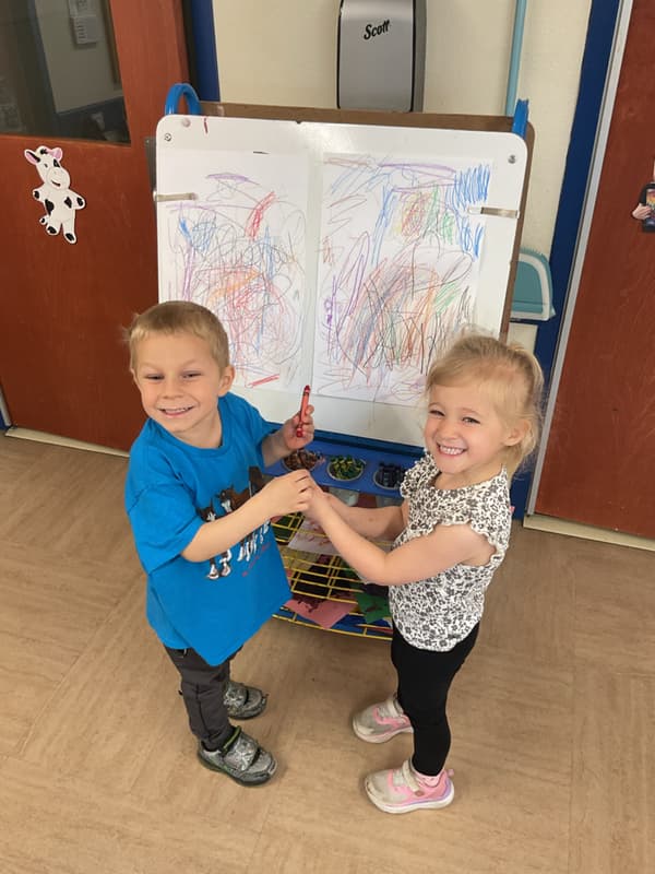 two children coloring
