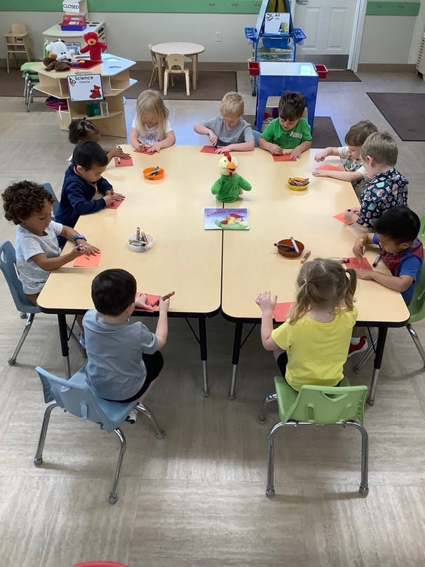 Students enjoying holiday classroom activity at North Fort Worth childcare center