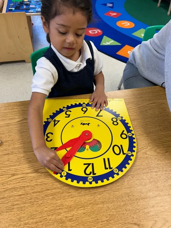 Our young learners are exploring the concept of time with clocks today! Hands-on activities like this help build early math skills, teach responsibility, and make learning fun.