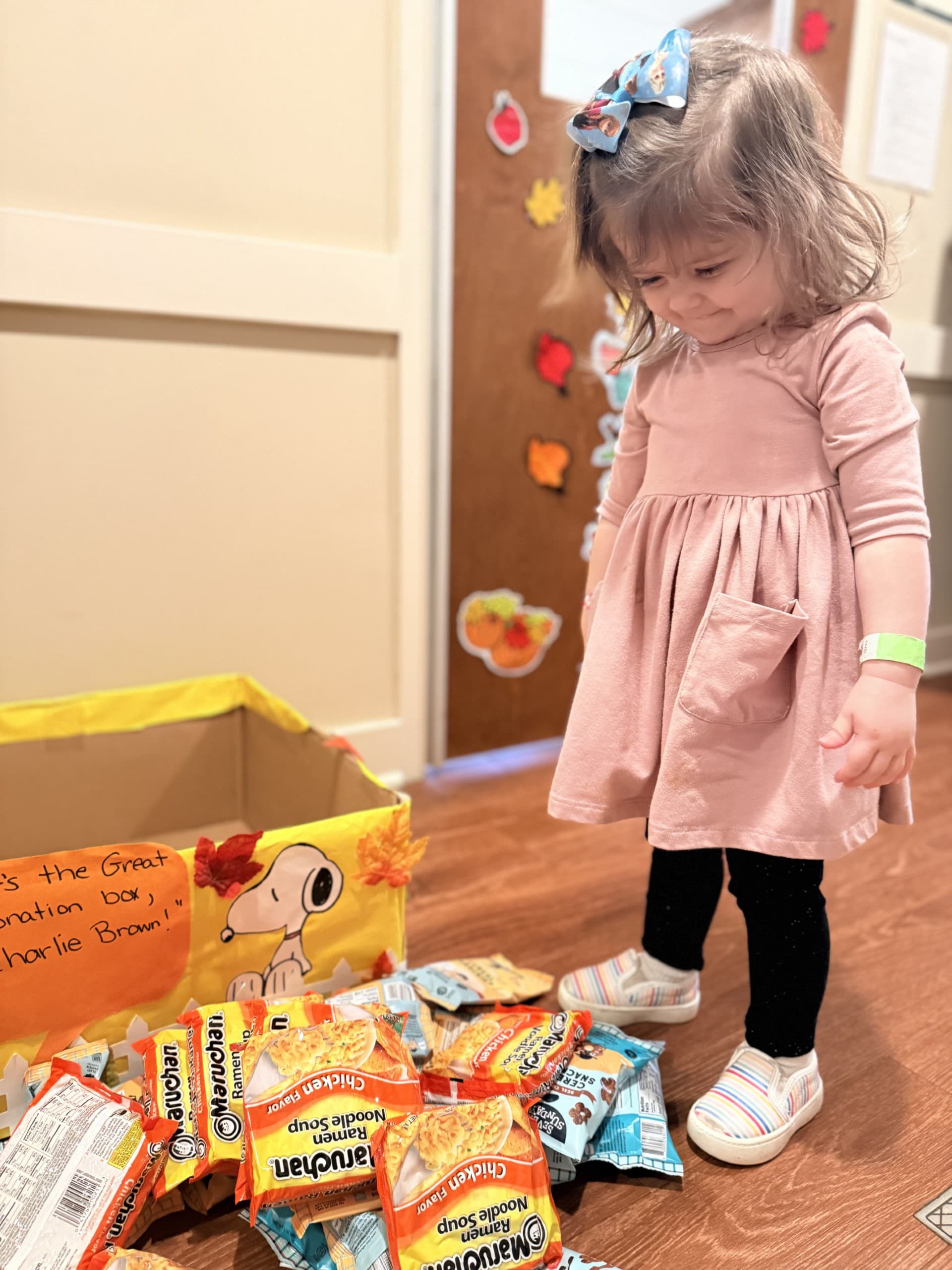 Child smiling at donations