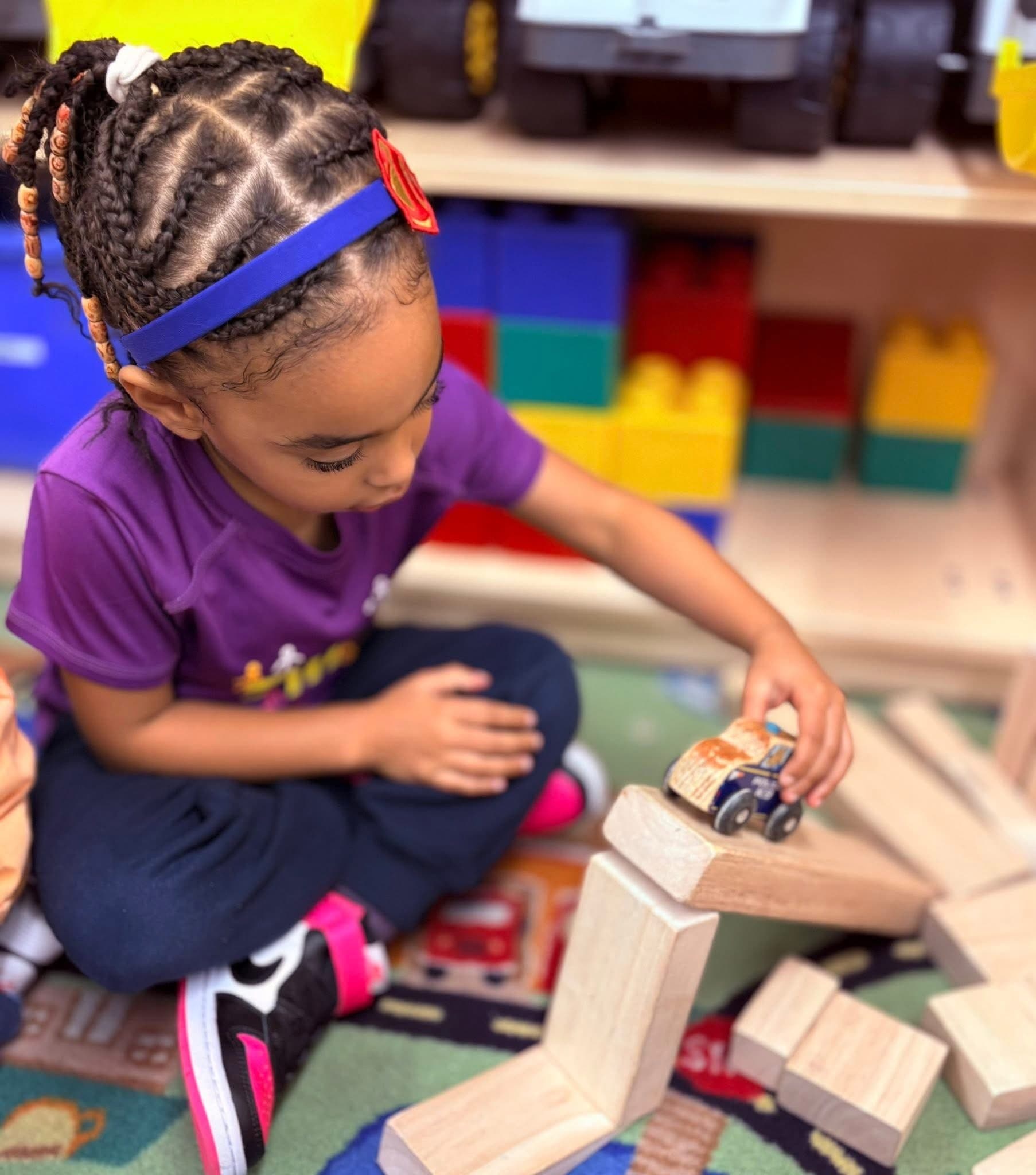 Preschool children building with blocks during learning centers in Fort Worth