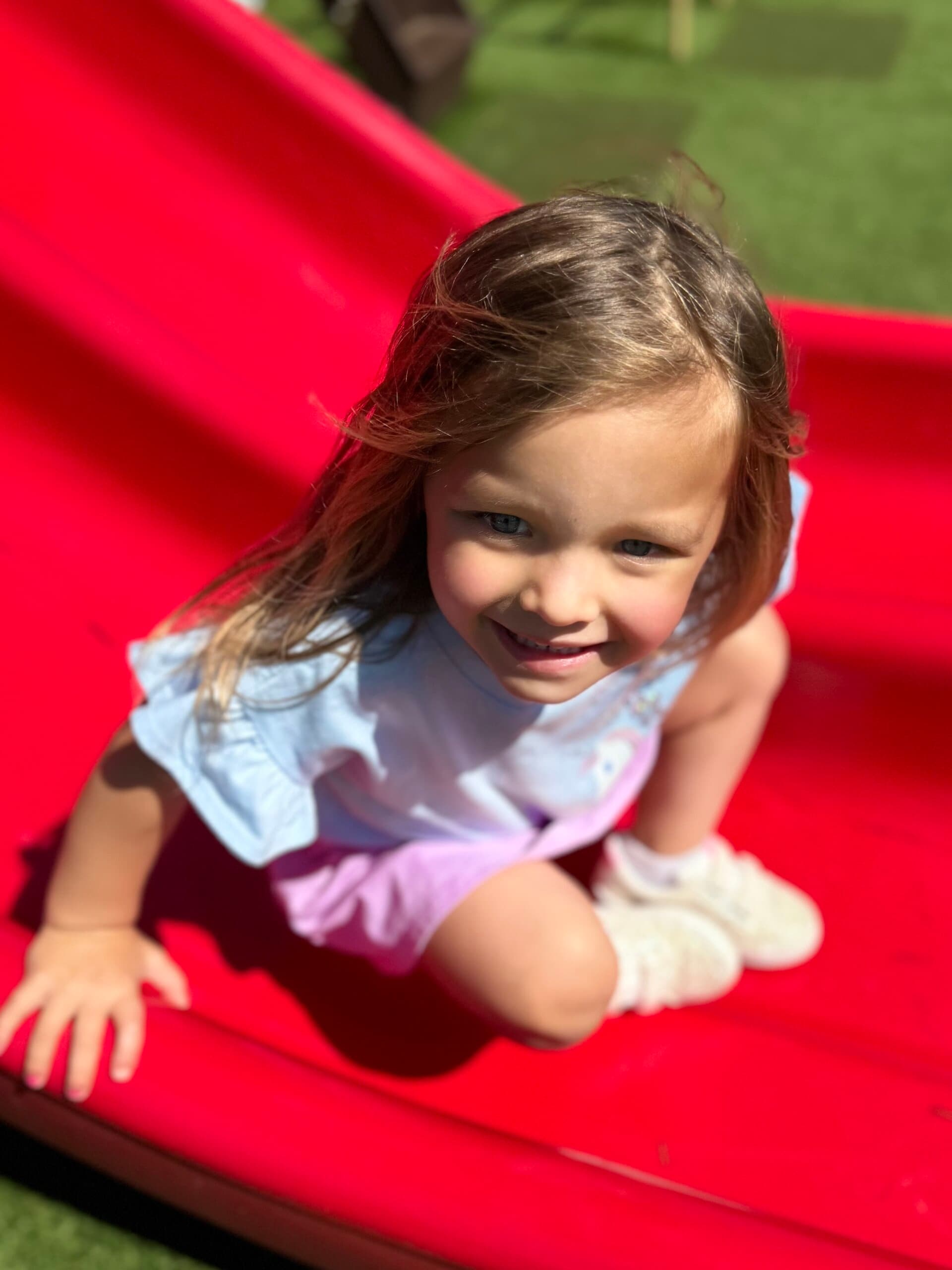 child on slide