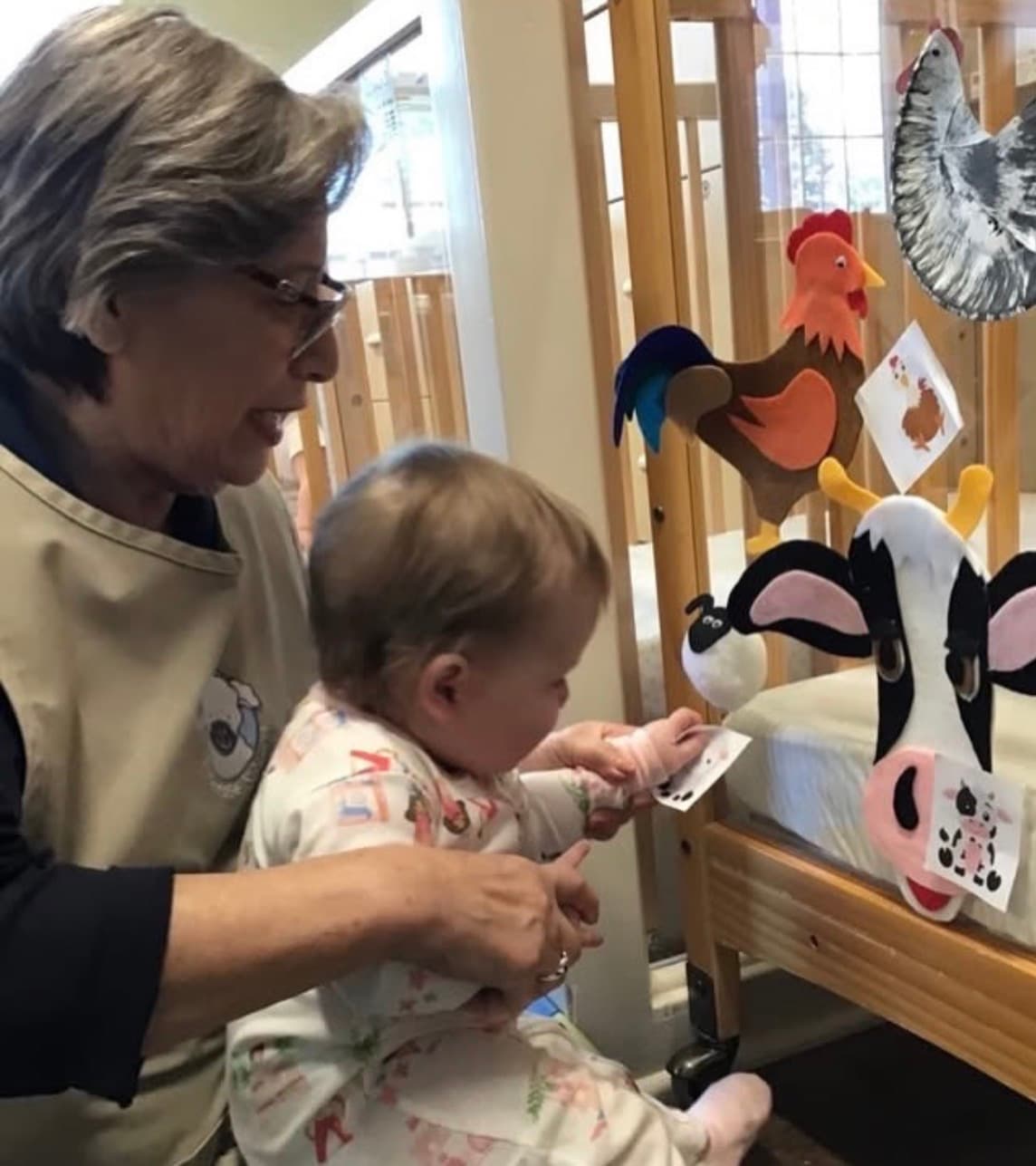 infant using a felt story board