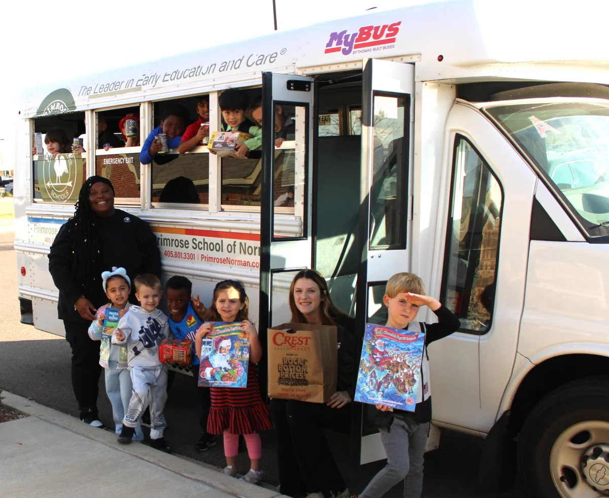 Children In front of the primrose bus