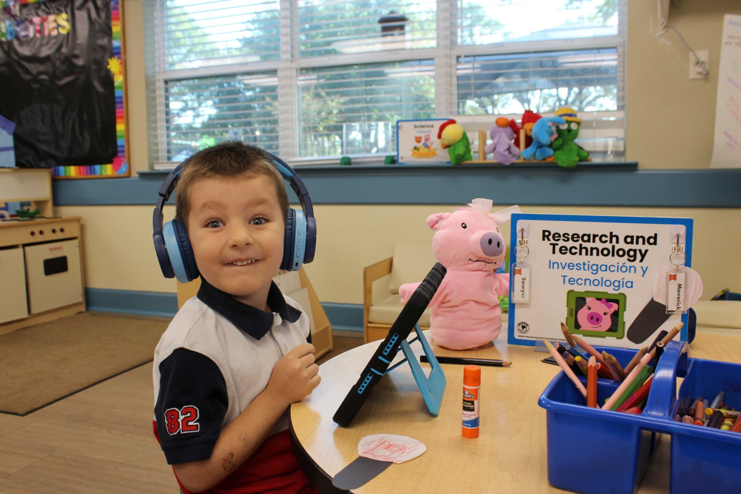 Children in research and technology center helping a primrose friend at a preschool near you