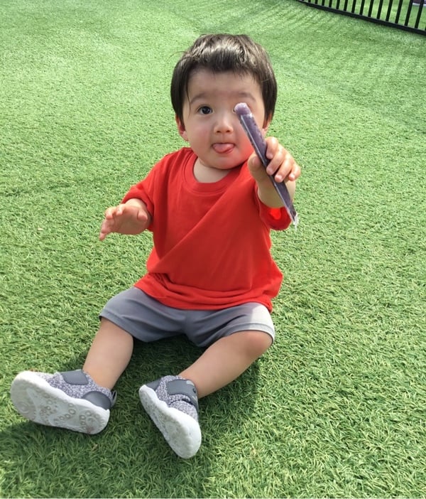 Toddler enjoying a sweet summer treat!
