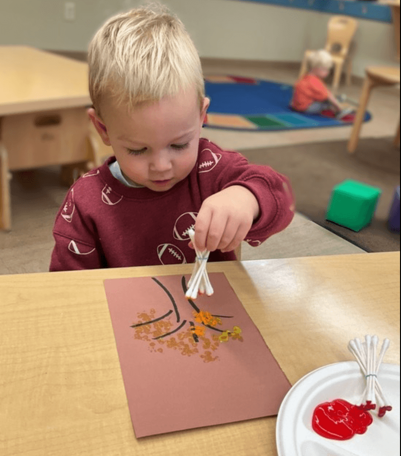 photo of child painting