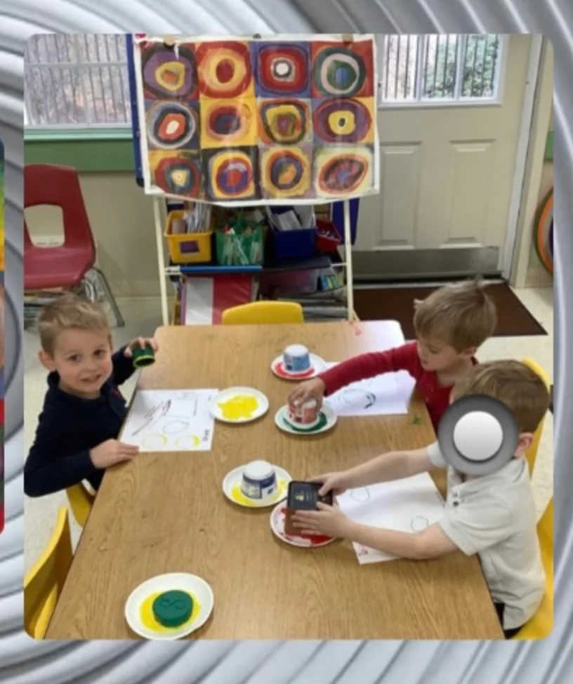 Preschool students at Primrose School of Heritage Wake Forest creating Kandinsky-inspired art during Early Art Masters.