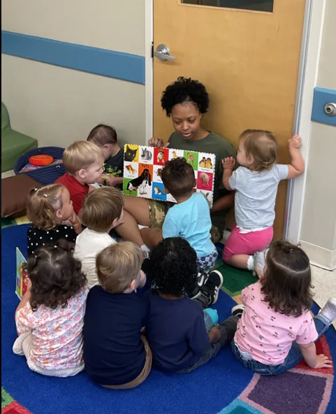 teacher reading to students