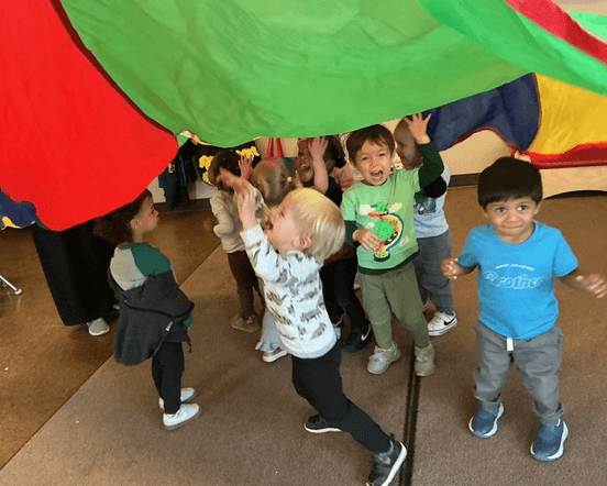 young children playing with pretend healthy food