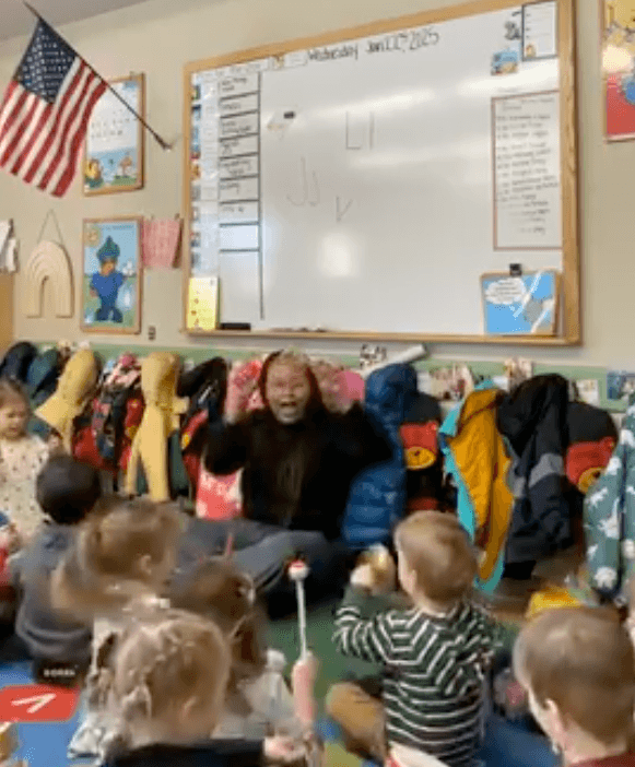 Preschool students participating in group musical lessons