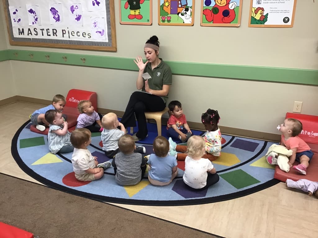 Sitting at circle time.