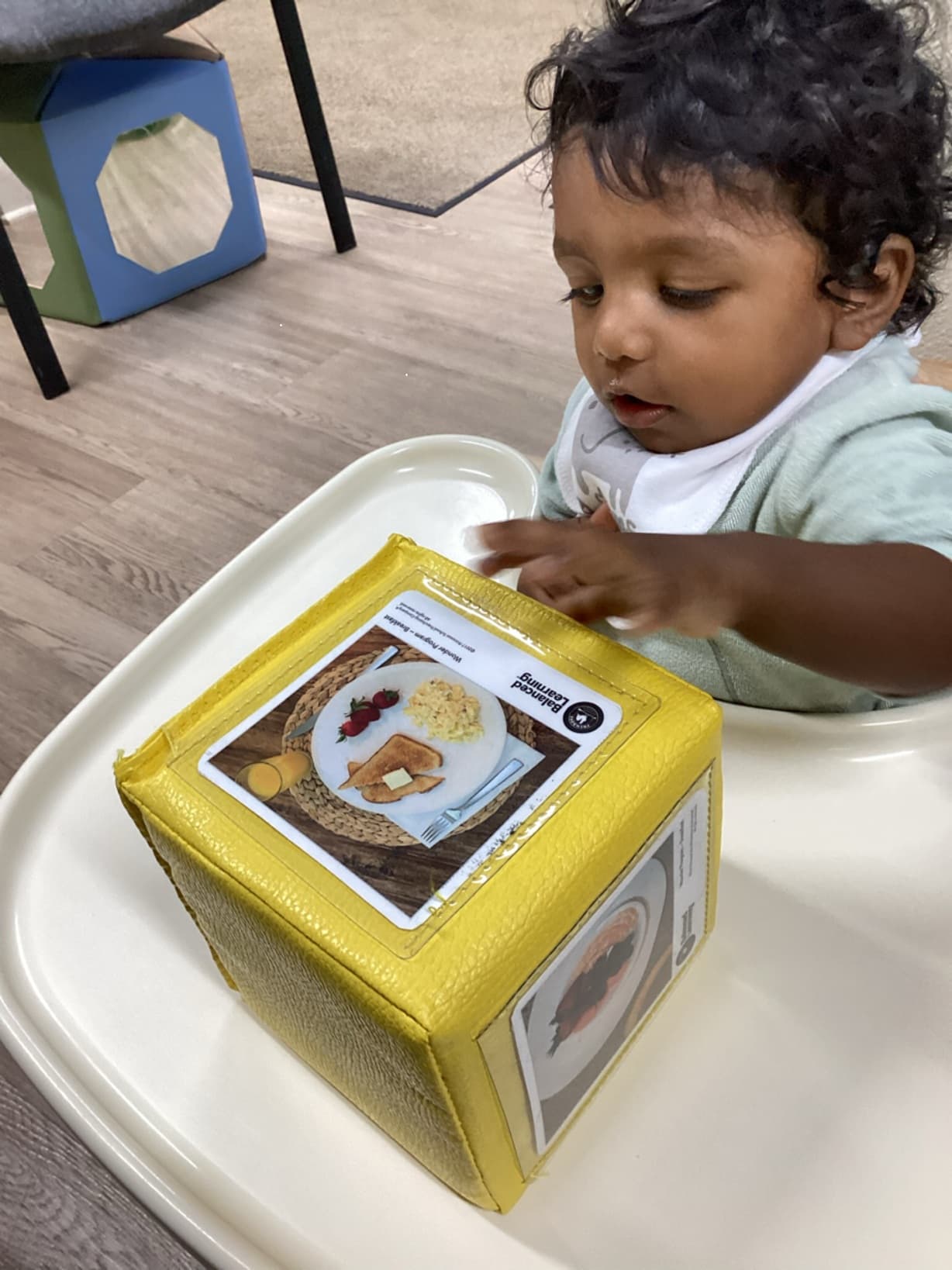 Infant Young Classroom learning different food options at Primrose School North Lewisville. Lewisville, TX