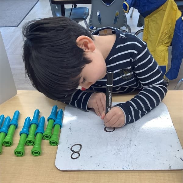 PK Students counting toys