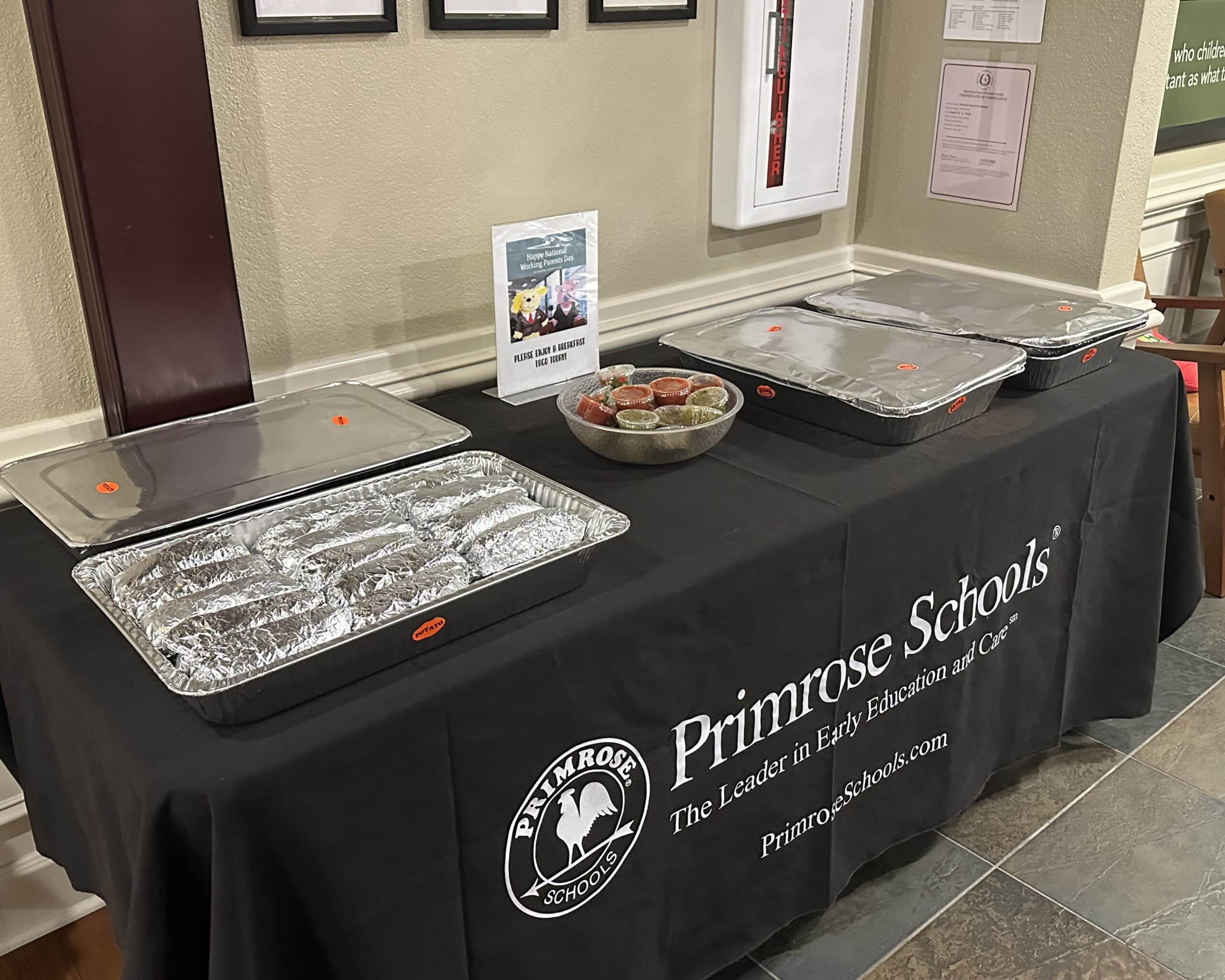 Table set up with food and sign
