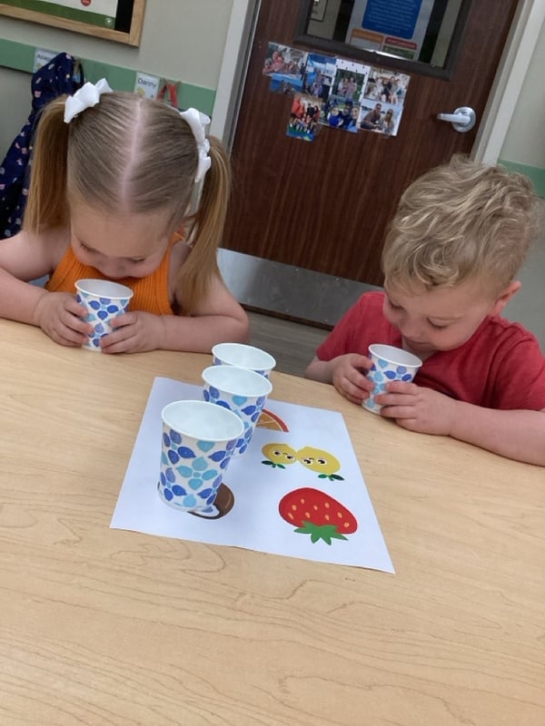 children smelling various things