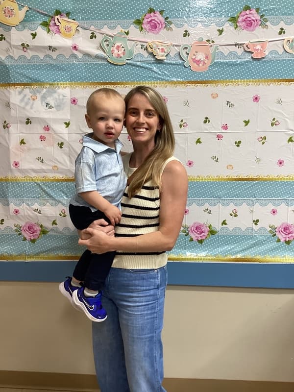 mother with toddler smiling